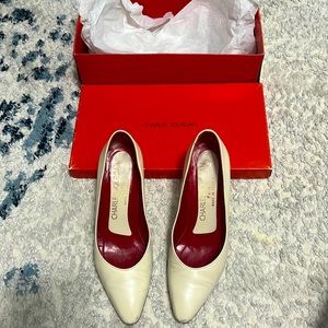 Sold—— white leather Charles jourdan pump heels